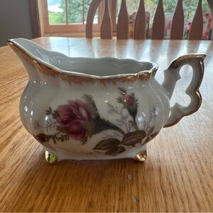 Dainty elegant antique mini creamer moss rose pattern and brush gold trim.